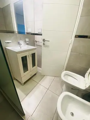 a bathroom with a sink and a toilet and a shower at Av Estrada 48 B Nueva Córdoba in Cordoba