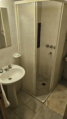 a bathroom with a shower and a sink at Apartamento en Nueva Córdoba in Cordoba