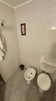 a bathroom with a toilet and a bidet at Apartamento en Nueva Córdoba in Cordoba