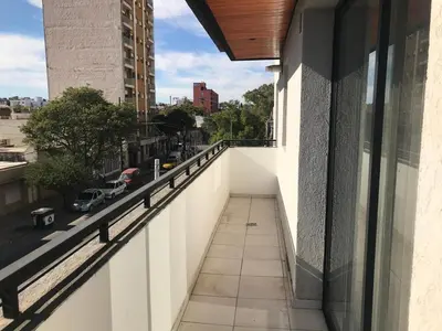 a balcony of a building with a view of a street at Two paxs in Cordoba