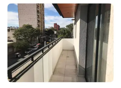 a balcony of a building with a view of a street at Two paxs in Cordoba