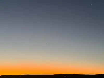 an orange and blue sky at sunset at Cabañas AdamiS 2 in Villa Cura Brochero
