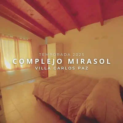 a bedroom with a bed in a room at Complejo Mirasol en Carlos Paz in Villa Carlos Paz