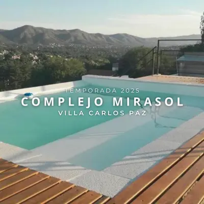 a sign for a villa with a swimming pool at Complejo Mirasol en Carlos Paz in Villa Carlos Paz