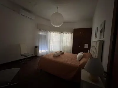 a bedroom with a bed with two pillows on it at CENTRO CORDOBA departamento 2 dormitorios in Cordoba