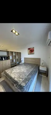 a bedroom with a large bed in a room at Departamento Miralejos 16 in Villa Carlos Paz