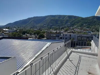 a view of a city from the roof of a building at Mis 4 estaciones in Villa Carlos Paz