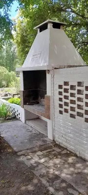 a white bird house with a roof at Complejo Pichona - Villa Carlos Paz - San Antonio in San Antonio de Arredondo