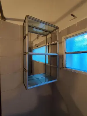 a glass window in a bathroom with at Salguero Centric Apartament D4 in Cordoba