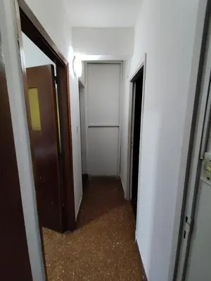 an empty hallway with a door and a hallway sidx sidx sidx at Salguero Centric Apartament D4 in Cordoba
