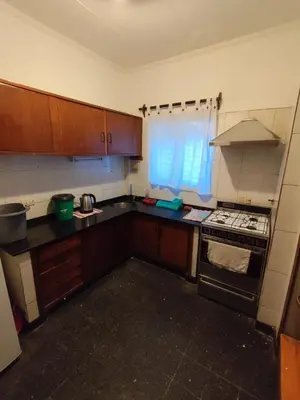 a small kitchen with a stove and a window at Salguero Centric Apartament D4 in Cordoba