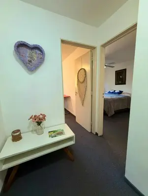 a room with a heart hanging on the wall at Cordoba, estadio Kempes, Cerro de las Rosas, Urca, Chateau, Siglo21, Aeropuerto in Cordoba