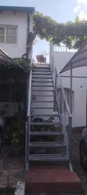 a set of stairs in front of a house at Casa Bela in Villa Carlos Paz