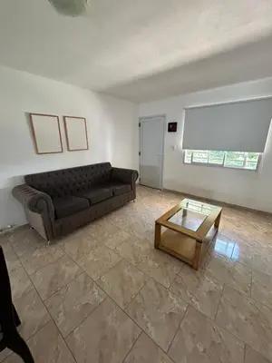 a living room with a couch and a coffee table at Río segundo in Río Segundo