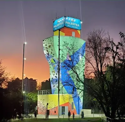 a building with a colorful tower in a park at Parques del Chateau in Cordoba