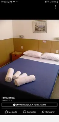 two towels on a bed in a hotel room at Hotel Hawai in Villa Carlos Paz
