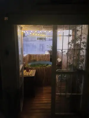 a view of a room with a hot tub through a door at Derpa Zion in Cordoba