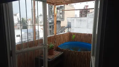a balcony with a hot tub and a window at Derpa Zion in Cordoba