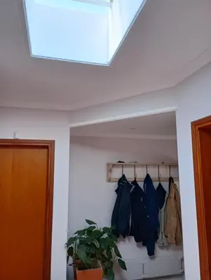 a skylight in the ceiling of a room with a closet at CASA RIO TERCERO Cordoba Argentina in Río Tercero