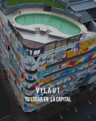 a building with a swimming pool on top of it at Apartamento con piscina en pleno centro de cordoba in Cordoba