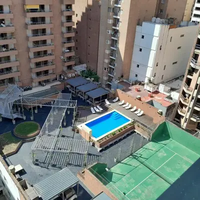 an overhead view of a swimming pool in a city at Departamento temporal in Cordoba