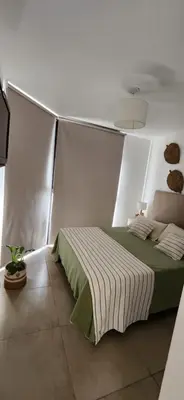 a bedroom with a bed in a tent at Dpto zona GRAL PAZ a cuadras de la Clínica Reina Fabiola in Cordoba