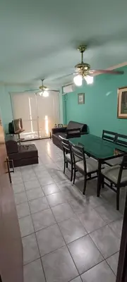 a room with a ping pong table and a couch at Departamento 1D Centro in Cordoba