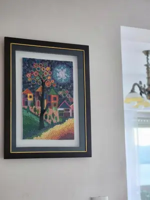 a painting of an apple tree on a wall at NUEVEAGUAS - Apartamento Panorámico sobre el Lago in Villa Carlos Paz