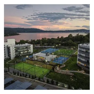 a view of a tennis court in a city at Departamento en el lago in Villa Parque Siquiman