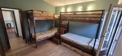 a room with two bunk beds in a room at Nautilus in Villa Icho Cruz