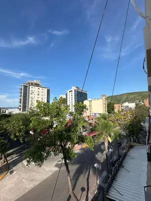 a view of a city with tall buildings at Duplex peatonal in Villa Carlos Paz