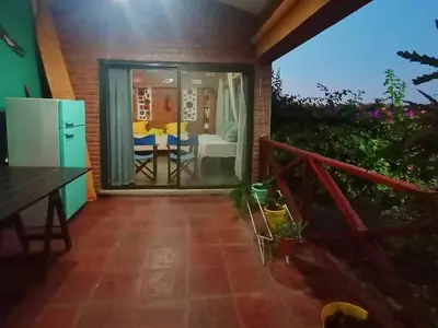 a view of a room with a kitchen and a balcony at El Mirador de Ana Villa de las Rosas in Villa de Las Rosas