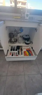 a white refrigerator with some food items in it at Santino in Cordoba