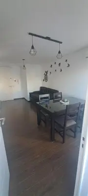 a living room with a couch and a table at Santino in Cordoba