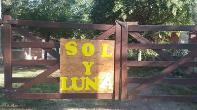 a gate with a sign that reads solo junka at Sol y Luna in Barrio Parque El Corcovado