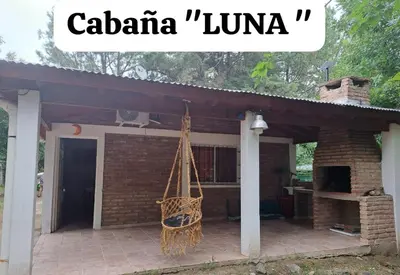 a porch of a house with a net at Sol y Luna in Barrio Parque El Corcovado