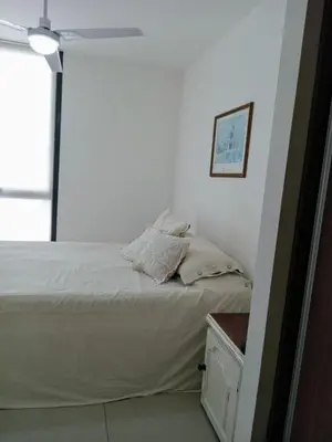 a bedroom with a bed and a window at Departamento centro Carlos Paz in Villa Carlos Paz