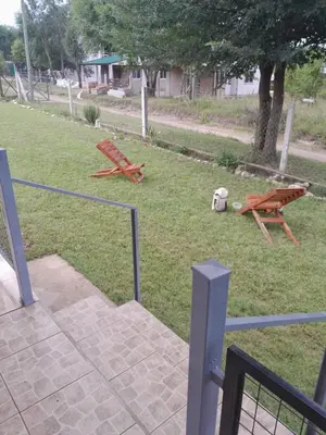 a park with a picnic table and a bench at Remanso in La Estancia