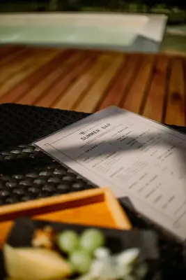 a piece of paper sitting on top of a keyboard at La Bernardita in Villa Berna