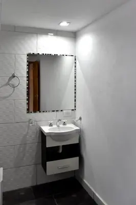 a bathroom with a sink and a mirror at Atrapa Sueños I in Embalse