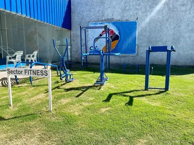 a group of playground equipment in the grass at Atrapa Sueños I in Embalse