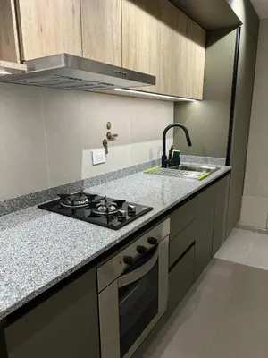 a kitchen with a stove and a sink at Cañada Premium- Imgo- Mostaza Sanchez in Cordoba