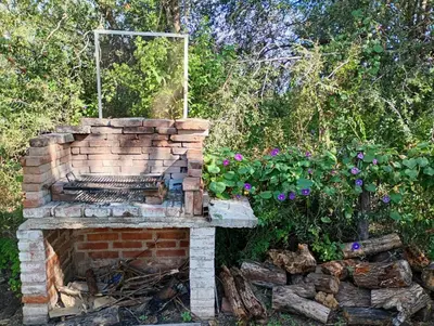 an outdoor brick oven with aperature at Casita Loma Hermosa in Mina Clavero