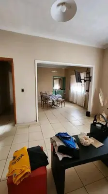 a living room with a couch and a table at Departamento house in Río Cuarto