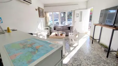 a living room with a map on a counter at Gen Viajero Hostel in Merlo