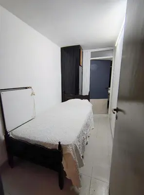 a bedroom with a bed in a room at Departamento luna in Villa Carlos Paz