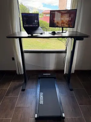 a desk with a laptop and a computer on it at Nomad Base en Country Chumamaya in Merlo