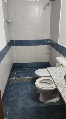 a bathroom with a toilet and a sink at La Terraza in Cordoba