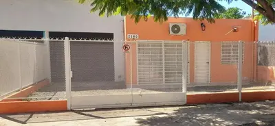 a fence in front of a building at Urbana Home Córdoba in Cordoba