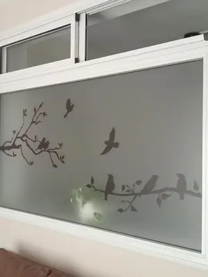 a window with birds on a branch wall sticker at Urbana Home Córdoba in Cordoba